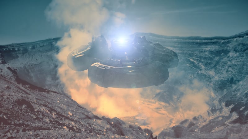UFO hovering over a field